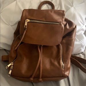 Tan also backpack,perfect condition, gold hardware